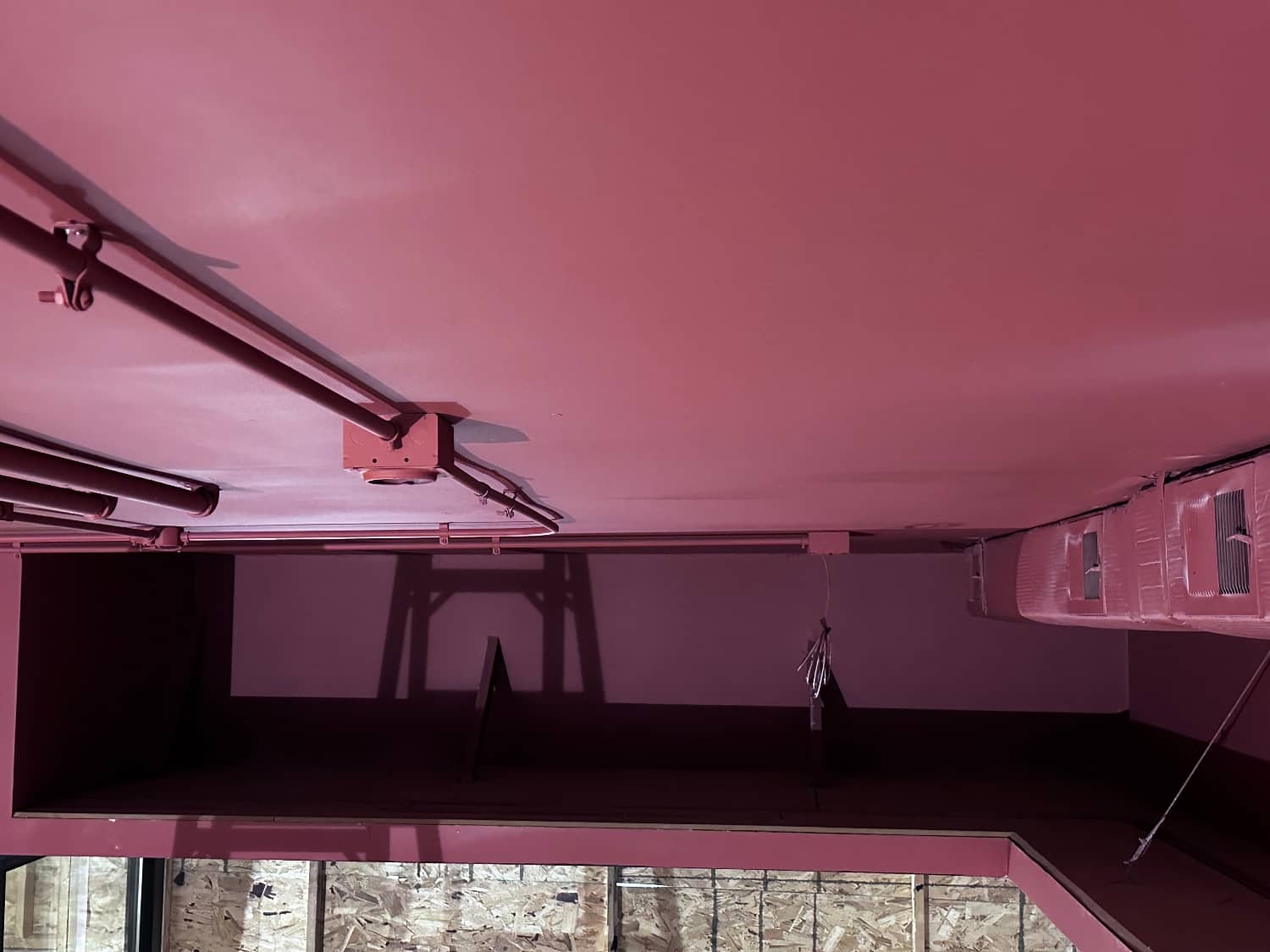 commercial building red painted ceiling