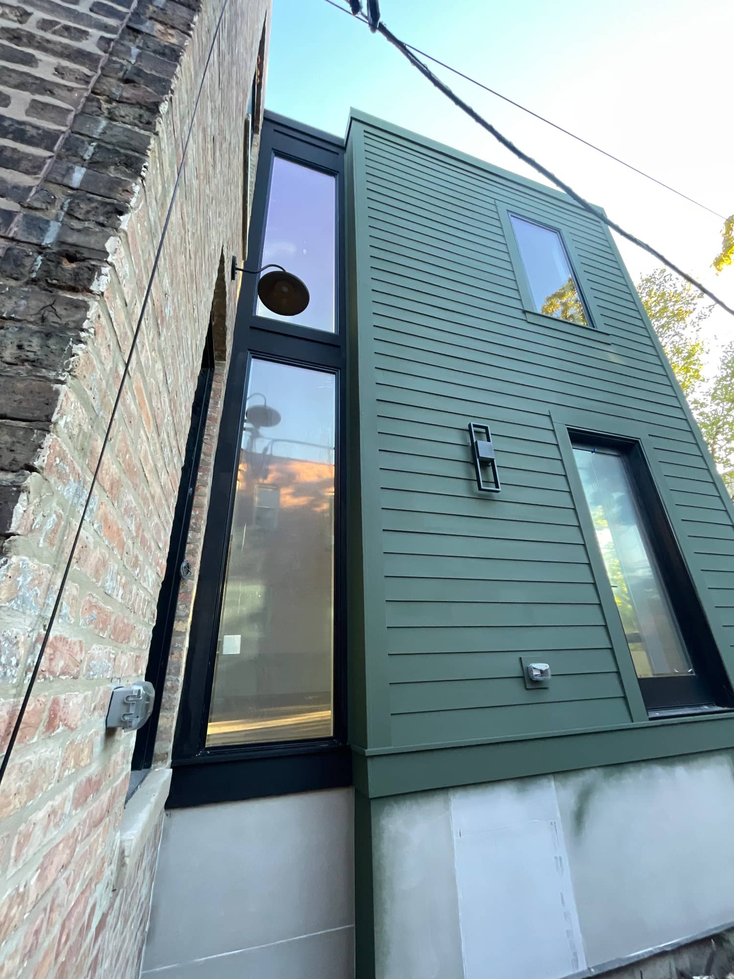 green painted home exterior side